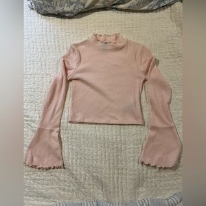 Pink ribbed crop with flute sleeves